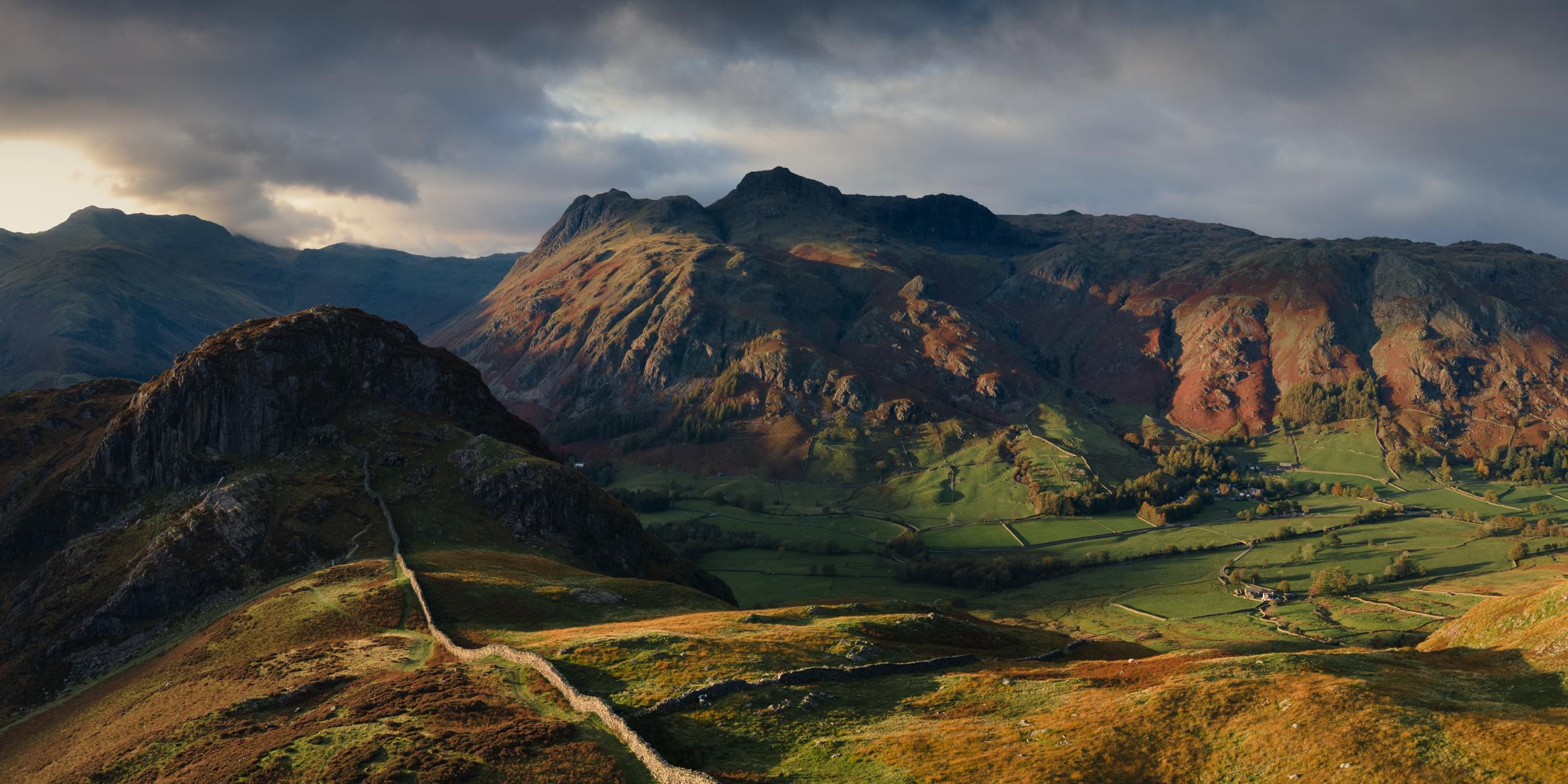 Drone panoramic from over Lingmoor Fell with Side Pike and the Langdale Pikes behind.